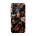 Fundas Premium MINUX para iPhone y Samsung Galaxy - Raw Amber Crystals